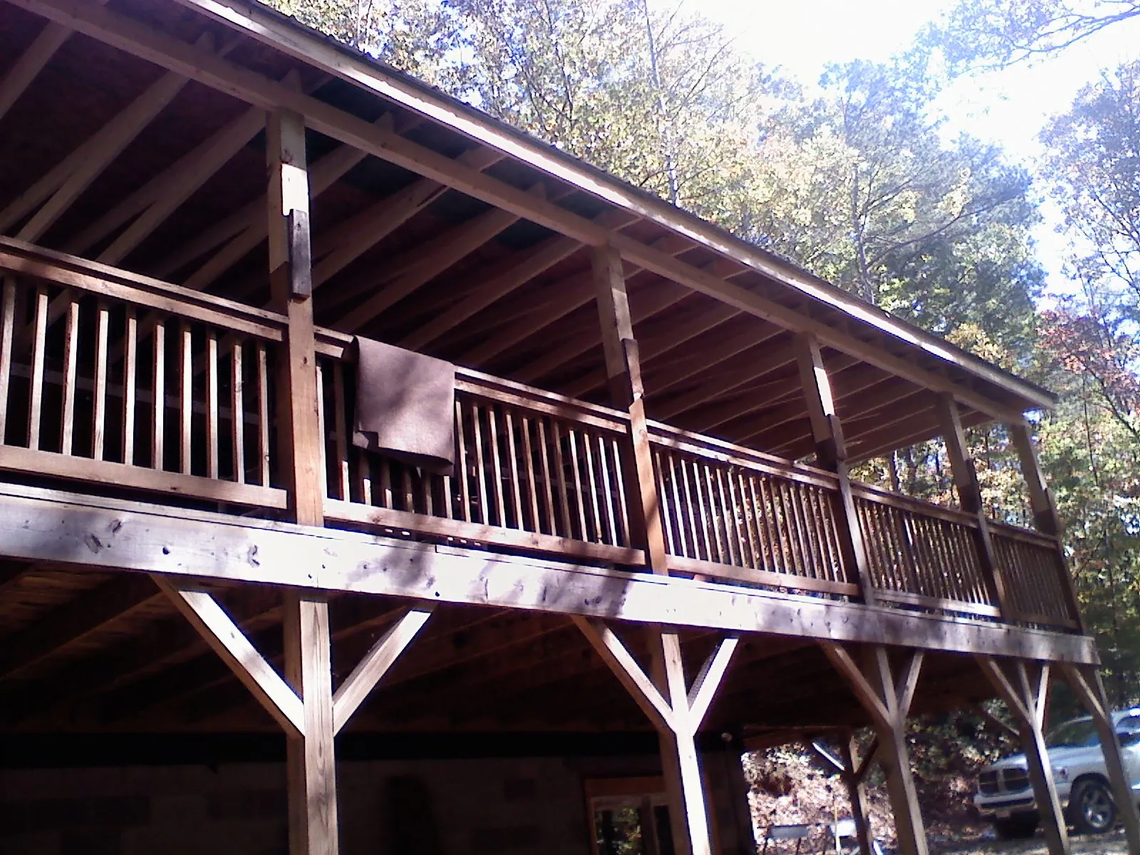 Timber framing under a new elevated porch and deck — Roof Leak Repair in Grand Lake by Roofing Brothers